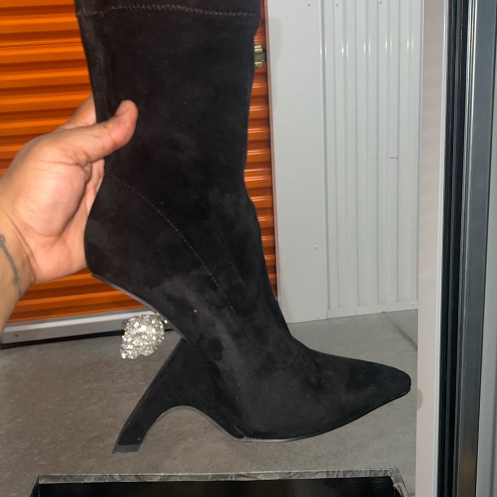 Unique skull cut out bootie heel